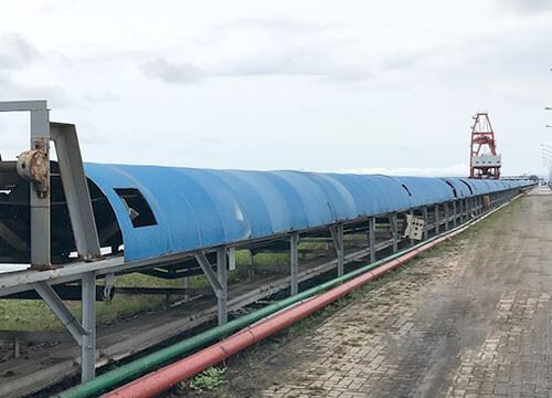 Hættedæksel til båndtransportør